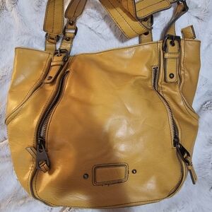 Nine West bag, excellent used condition. Mustard Yellow.  Measures: 15"L x 12"H